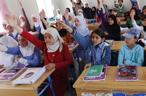 Syrian refugee students attend a class in a UNICEF school at the Al Zaatari refugee camp in Mafraq (Source: Thomson Reuters F