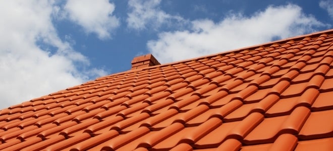 <p>A Tile Roof (Image Courtesy: <a href="https://www.doityourself.com/stry/how-to-walk-on-a-tile-roof" target="_blank" role="link" rel="nofollow" class=" js-entry-link cet-external-link" data-vars-item-name="DoItYourself" data-vars-item-type="text" data-vars-unit-name="59f36fe9e4b06acda25f498a" data-vars-unit-type="buzz_body" data-vars-target-content-id="https://www.doityourself.com/stry/how-to-walk-on-a-tile-roof" data-vars-target-content-type="url" data-vars-type="web_external_link" data-vars-subunit-name="article_body" data-vars-subunit-type="component" data-vars-position-in-subunit="0">DoItYourself</a>)</p>