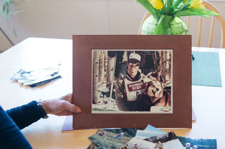 <p>Patricia Martin holds an old photograph of husband Robert, who died from prostate cancer in 2014. Patricia enrolled Robert in hospice when the cancer reached his brain, but said she did not get the care she expected.</p>