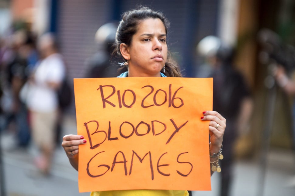 Thousands of people demonstrate against the Olympic Games Rio 2016 and Brazil's interim President Michel Temer at Saens Pena