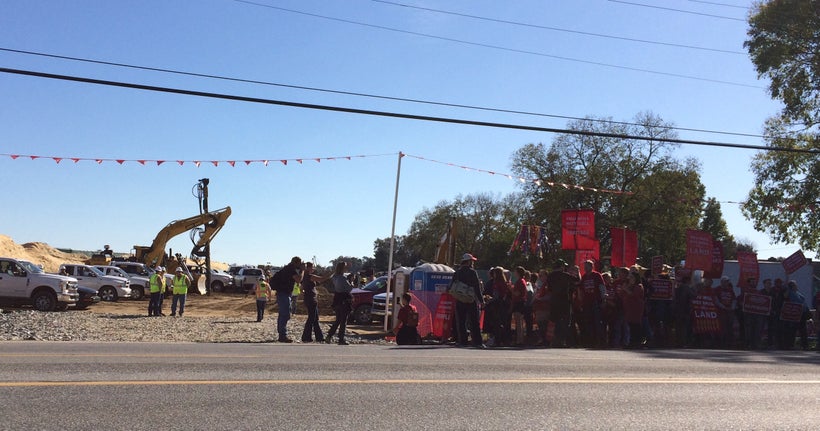 Protesters prepare to offer bread to pipeline workers in Columbia, Pennsylvania on the route of the Atlantic Sunrise Pipeline
