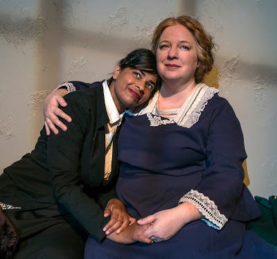 Vida (Radhika Rao) and Rose (Gwen Loeb) take a break from the picket line in a scene from <strong><em>Strange Ladies</em></st