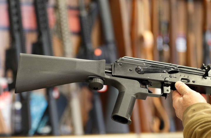 A bump stock device (left) fits on a semi-automatic rifle to increase the firing speed, making it similar to a fully automatic rifle.