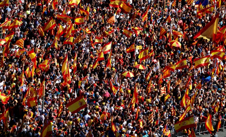 Pro-unity supporters take part in a demonstration in central Barcelona, Spain, October 29, 2017. 