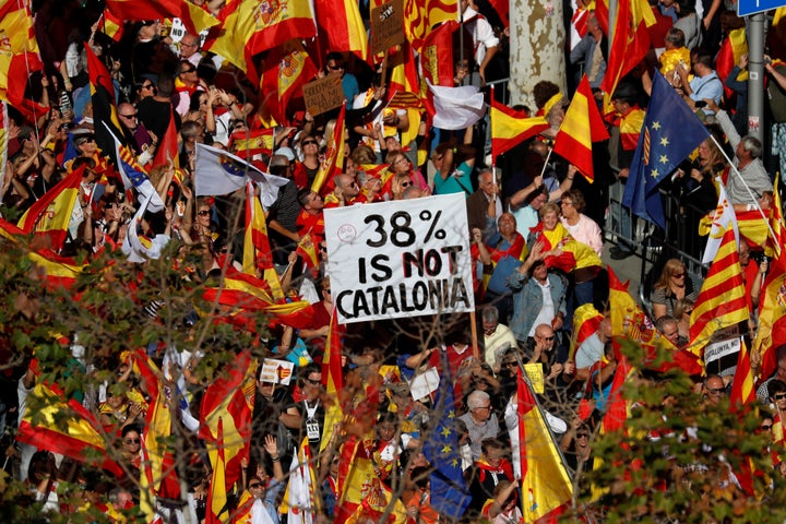 Pro-unity supporters take part in a demonstration in central Barcelona, Spain, October 29, 2017. 