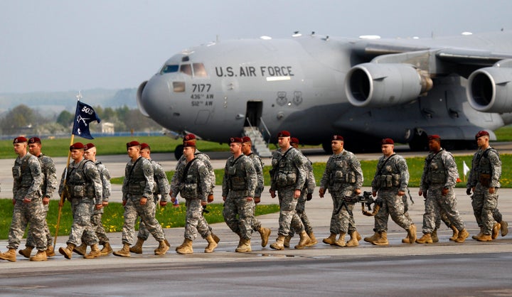 About 150 U.S. paratroopers from the U.S. Army's 173rd Infantry Brigade Combat Team based in Italy march as they arrive to participate in training exercises with the Polish army in Swidwin, northewest Poland April 23, 2014. 