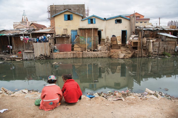 Untreated sewage mixes with runoff water in the Antohomadinika community of Antananarivo and flows within meters of housing residences. 