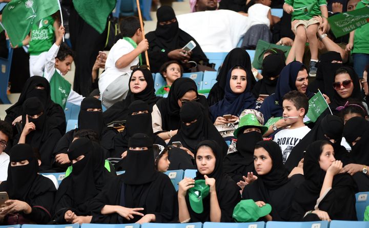 Women commemorate the anniversary of Saudi Arabia's founding at King Fahd International Stadium in Riyadh on Sept. 23, 2017. Strict rules on public segregation of the sexes have effectively barred women in Saudi Arabia from entering sports arenas.