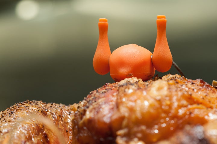 A re-usable Norpro brand turkey timer signals the bird is ready to eat during an evaluation of different pop-up devices at the CulinAerie cooking school in Washington, D.C. on Oct. 28, 2015.