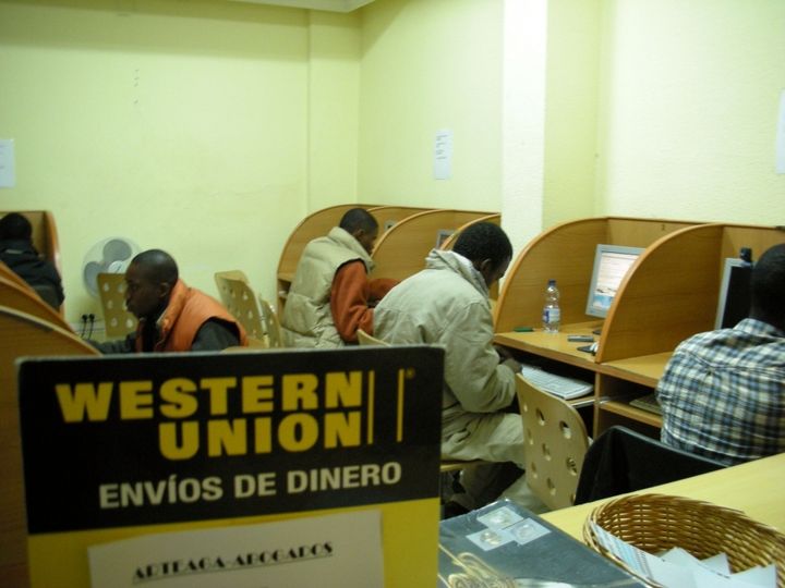 <p>Workers sending home money home via Western Union, which can charge up to 15% of the transferred funds</p>