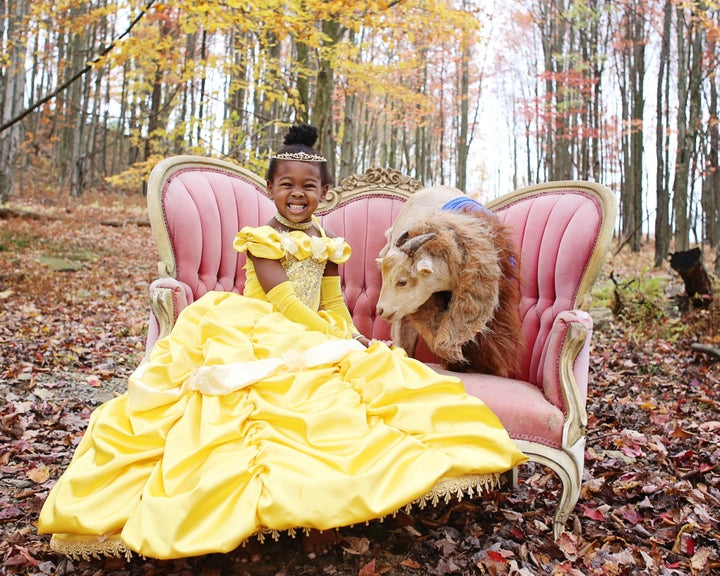 Lindsey Bonnice's kids and pets wear coordinated Halloween costumes. 