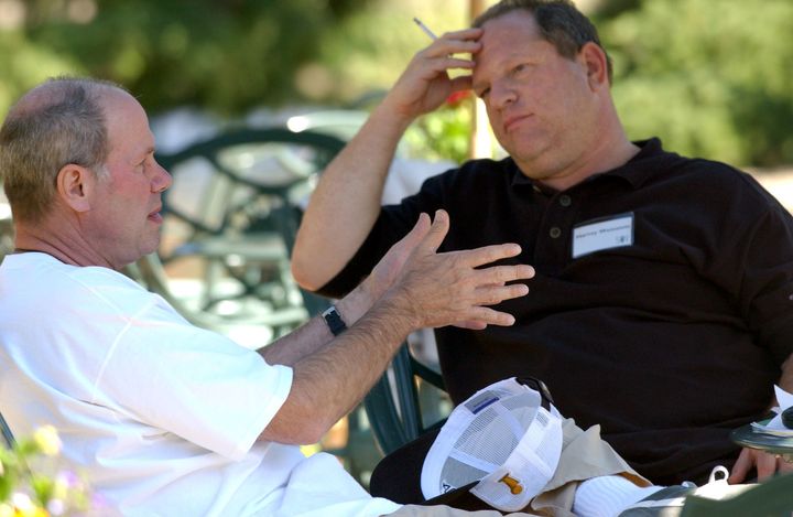 Michael Eisner, then CEO of the Walt Disney Company, talks with Harvey Weinstein back in 2004.