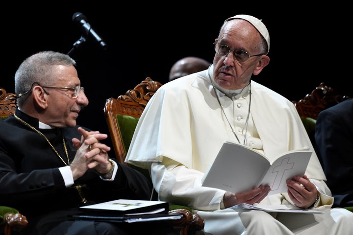 President of the Lutheran World Federation Bishop Munib Younan (L)and Pope Francis attend an ecumenical event at the Malmo Arena on October 31, 2016 in Malmo, Sweden. Pope Francis kicked off a two-day visit to Sweden to mark the 500th anniversary of the Reformation -- a highly symbolic trip, given that Martin Luther's dissenting movement launched centuries of bitter and often bloody divisions in Europe.