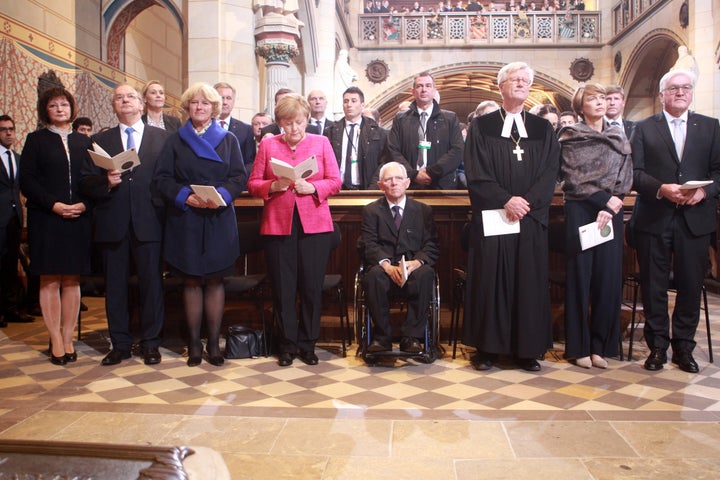 German President Frank-Walter Steinmeier, his wife Elke Buedenbender, the Chair of the Council of the Evangelical Church in Germany Heinrich Bedford-Strohm, the President of the Bundestag (lower house of parliament) Wolfgang Schaeuble, German Chancellor Angela Merkel, the Federal Government's Commissioner for Culture and the Media Monika Gruetters and Saxony-Anhalt's State Premier Reiner Haseloff attend a religious service to commemorate the 500th anniversary of the Reformation at Schlosskirche church on Reformation Day on October 31, 2017 in Wittenberg, Germany. 