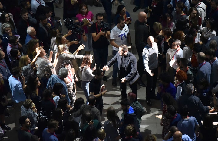<p>Verdi’s Stiffelio: The title character (Luciano Ganci) and his adoring followers mixed up with audience members</p>
