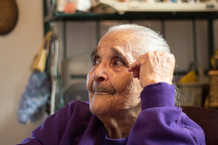 Margarita Herrera of Modesto, CA looks on as her daughter Betsy gets her medication ready and prepares her lunch. Margarita, 78, lives with rheumatoid arthritis, and her daughter left her career behind to care for her full-time through IHSS. 