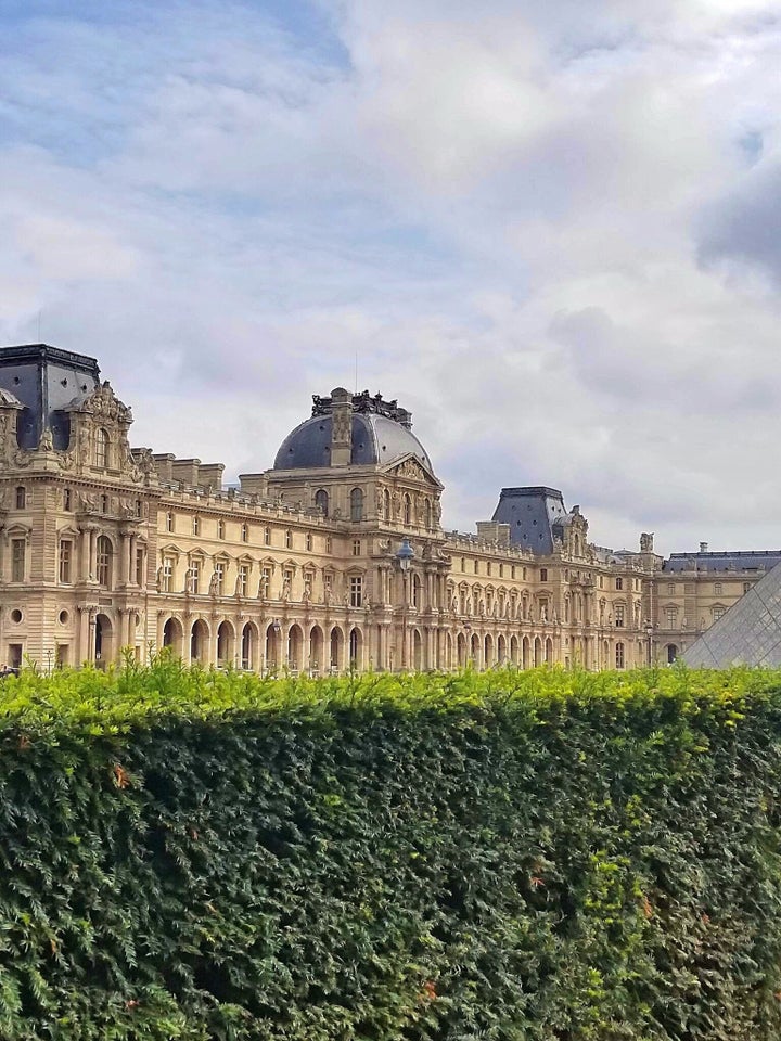 <p>What visit to Paris is complete without a visit to the Louvre -even if you don't go in?</p>