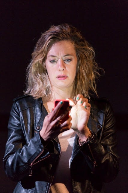 <p>Alicia (Brenna Palughi) has trouble disconnecting from her smartphone in <strong><em>Small Mouth Sounds</em></strong></p>