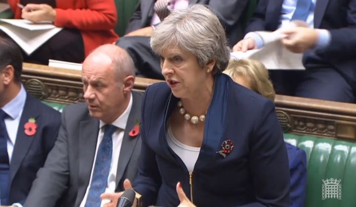 First Secretary of State Damian Green listens as Prime Minister Theresa May speaks during Prime Minister's Questions in the House of Commons, London.