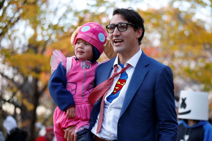 Justin Trudeau carries his son Hadrien while participating in Halloween festivities at Rideau Hall in Ottawa, Ontario, Canada on Oct. 31.