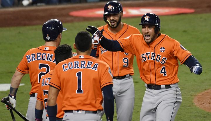 Houston Astros center fielder George Springer (4) celebrates a two-run homer in the second inning. 