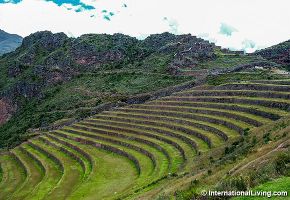 Sacred Valley, Pisac. Farm terraces and village. Pisac, Peru.