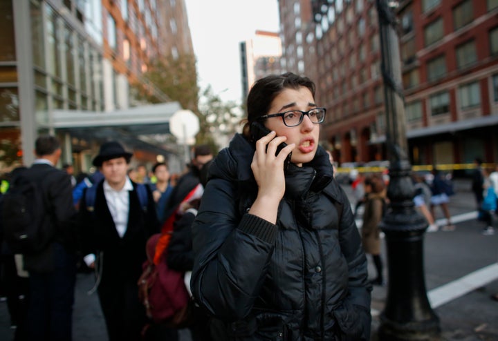 Students from Stuyvesant high school are evacuated after a man driving a rental truck struck and killed eight people on a jogging and bike path in Lower Manhattan on October 31, 2017 in New York City.