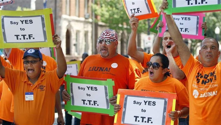 New Jersey construction workers rally in favor of a gas tax hike, which was enacted. The increase was packaged with the elimination of the state’s estate tax and a cut in sales taxes.