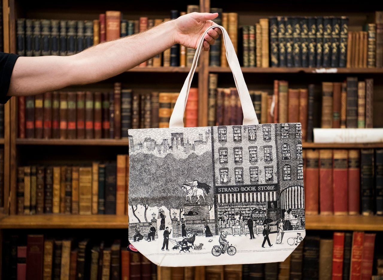 "Victorian Readers," another tote MacDonald designed, features a number of intricate details you might miss at first glance.