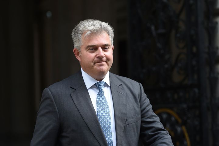 Immigration Minister Brandon Lewis is busy with "difficult reading" 