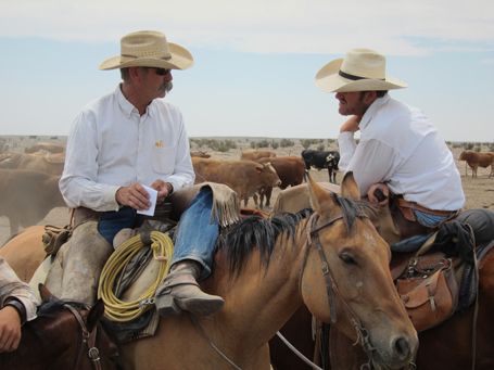 <p>Duke & Duke Philips, talking shop on the Ranch. </p>