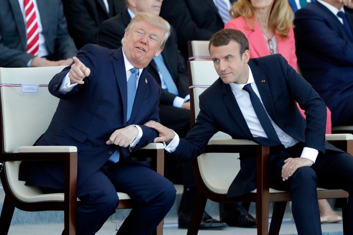 French President Emmanuel Macron and U.S. President Donald Trump attend the traditional Bastille Day military parade on the C