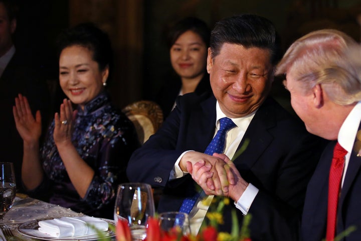 Chinese President Xi Jinping shakes trump's hand during a dinner at the start of a summit at the president's Mar-a-Lago estate in April.