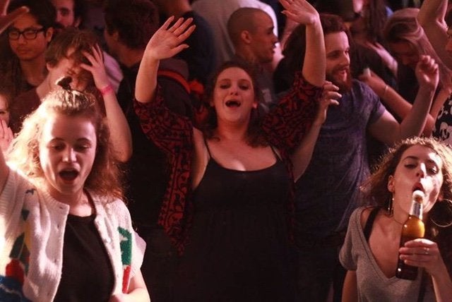 People dancing at an event at The Hive