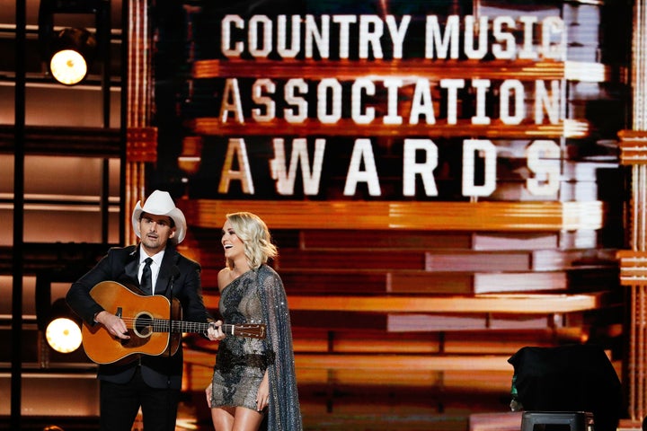 Brad Paisley and Carrie Underwood appear onstage at the 2016 CMA Awards.