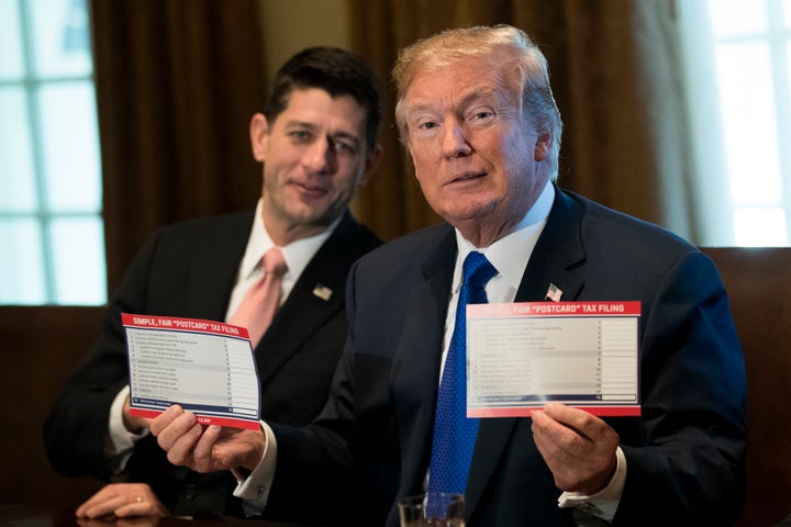 Speaker of the House Paul Ryan looks on as President Donald Trump speaks about tax reform legislation in the Cabinet Room at the White House on Nov. 2, 2017 in Washington.