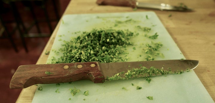 Cut, cut cut—Parsley gets the Jordanian treatment. That is, chopped tiny, so that all of the flavor bursts out.