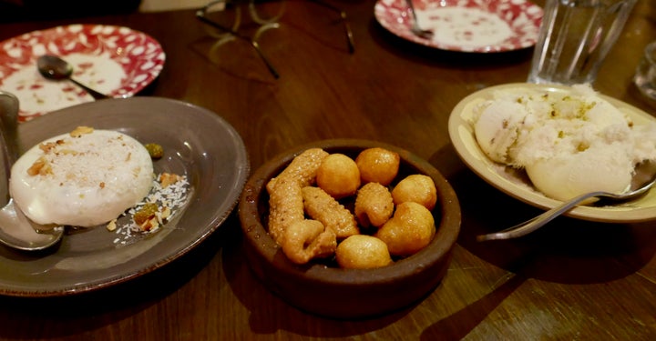 Just desserts—Rosewater-flavored custard, honey-soaked sesame bites and pistachio-stuffed cookies.