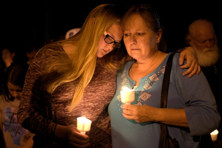 Terri and Brooke Kalinec attend a candlelight vigil after a mass shooting at the First Baptist Church in Sutherland Springs, Texas, on Nov. 5, 2017.