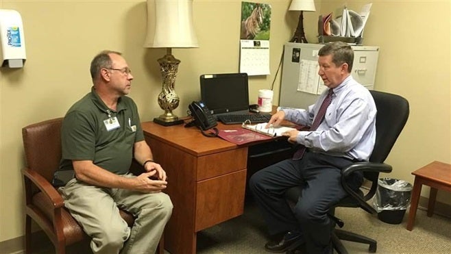 <p>Dr. Michael Wilkerson discusses a patient’s case with a nurse at a Bradford Health Services addiction treatment facility in Warrior, Alabama. When doctors become addicted to drugs or alcohol, confidential state programs must balance doctors’ welfare and patient safety.</p>