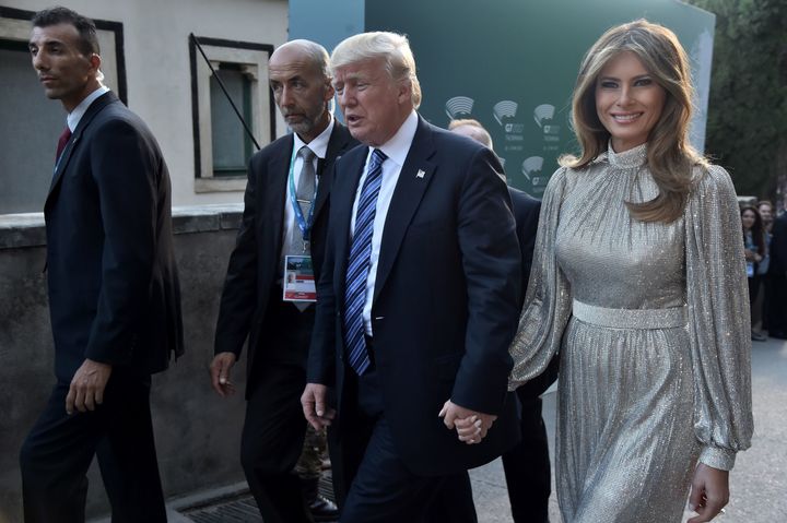 US President Donald Trump and first lady Melania Trump arrive for a concert of La Scala Philharmonic Orchestra at the ancient Greek Theatre of Taormina during the Heads of State and of Government G7 summit, on May 26 in Sicily.
