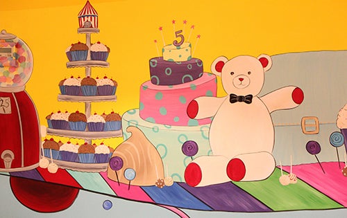 <p><strong>The shop’s party room features a sweet mural.</strong></p>