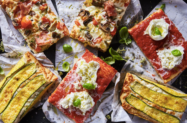 The Princi menu includes <a href="https://www.eater.com/2017/11/7/16612696/starbucks-princi-italian-bakery-seattle-roastery" target="_blank">focaccia pizza</a> "brushed with housemade pomodoro sauce," according to a Starbucks press release.