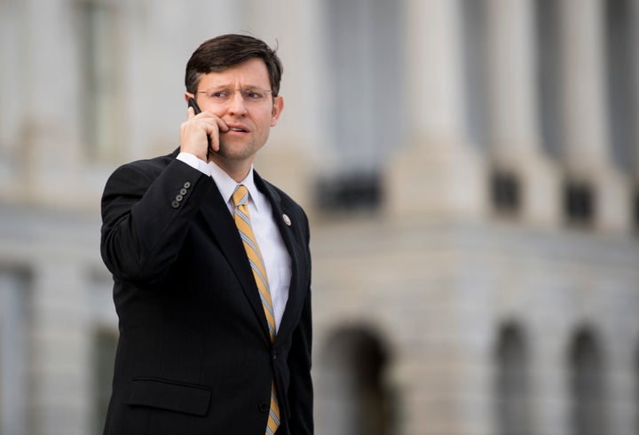 Rep. Mike Johnson (R-La.) introduced a measure in June that would chip away at the Marine Mammal Protection Act, and that measure is included in a new energy bill. Above, he speaks on the phone while on the House steps in January.