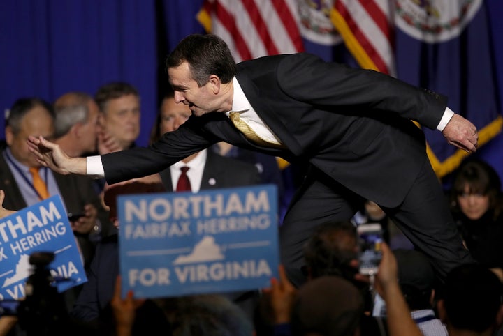 Democrat Ralph Northam celebrates his victory over Ed Gillespie to be governor of Virginia.