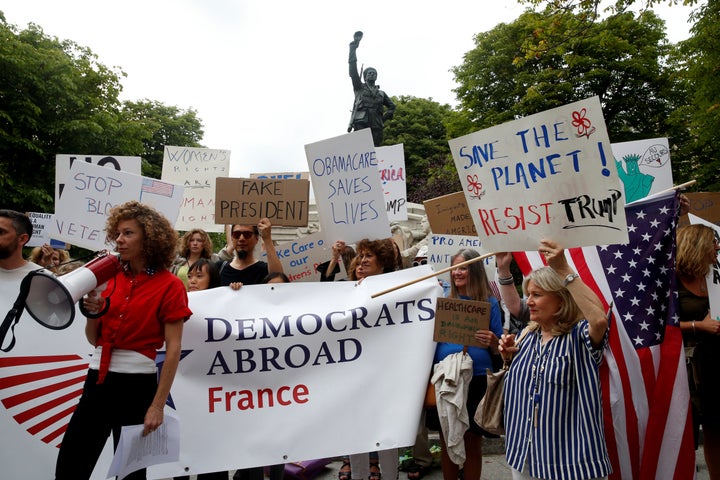 People gather to protest the visit of U.S. President Donald Trump in Paris on July 13, 2017.