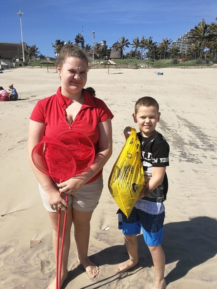 Siblings Alexis, 12, and Sabastian Keet, 8, collected nurdles on Durban's uShaka Beach.