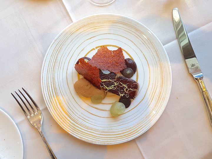 Restaurant Coworth Park’s sautéed duck liver served with grapes, almonds, and ginger 