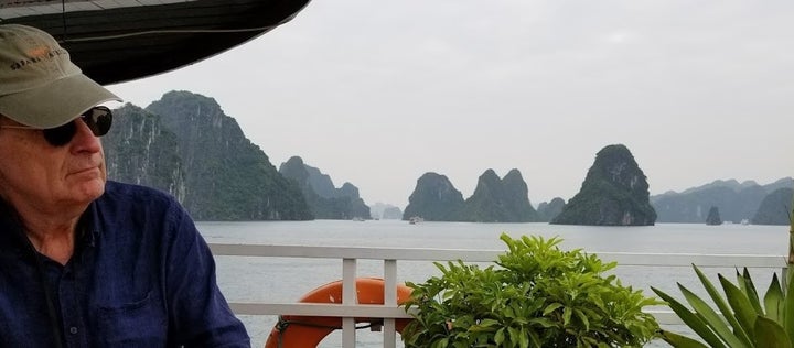 <p>Cruising Vietnam (author at Ha Long Bay October 2017) </p>