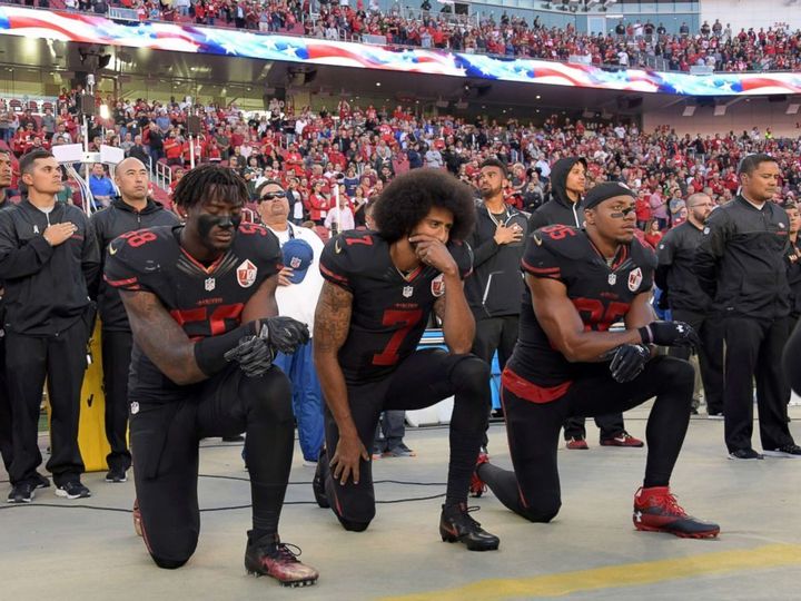 "I am not going to stand up to show pride in a flag for a country that oppresses black people and people of color. To me, this is bigger than football and it would be selfish on my part to look the other way." Colin Kaepernick, August 2016 (center), Eli Harold (left), Eric Reid (right)